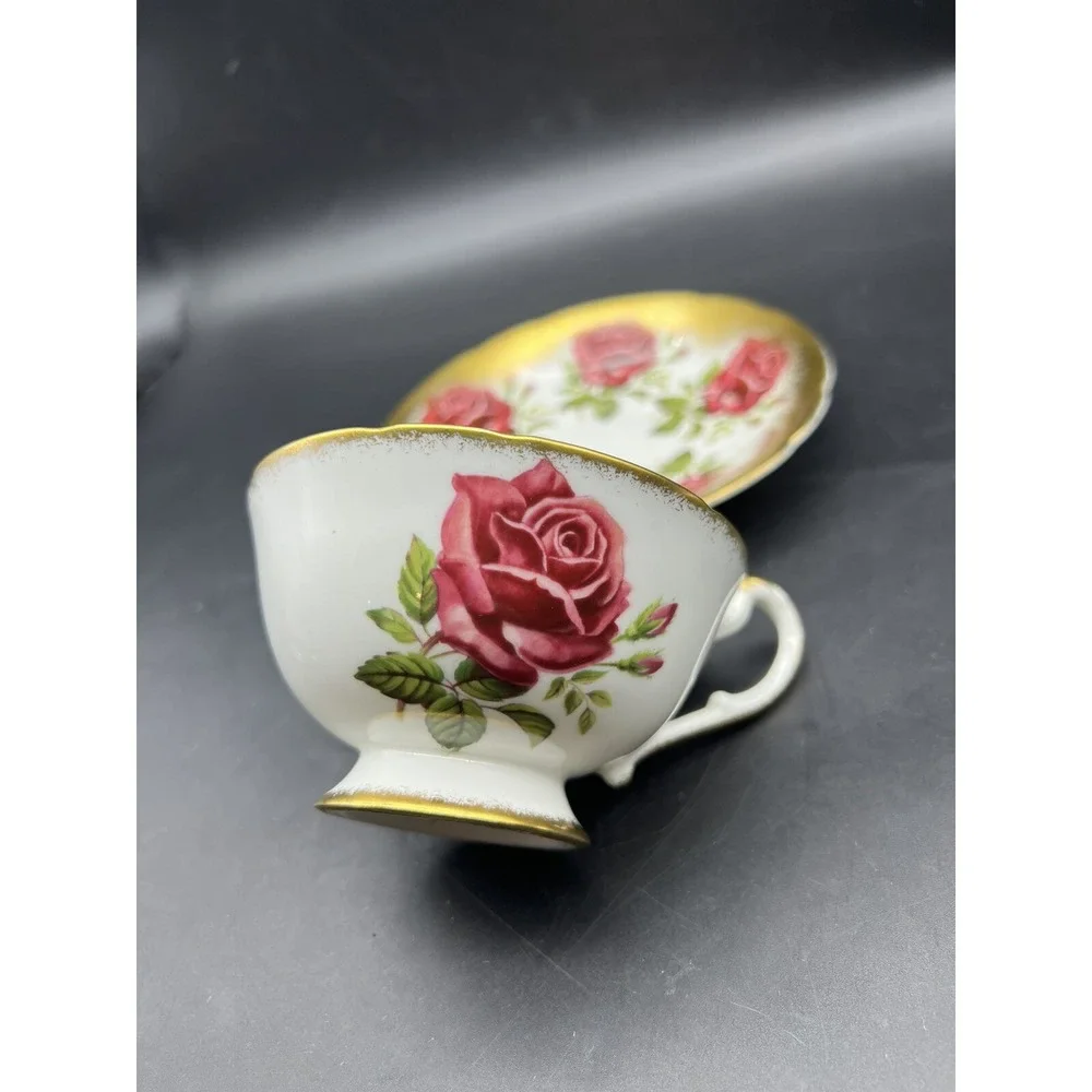 Vintage Paragon Floating Red Roses Gilded Tea Cup and Saucer England